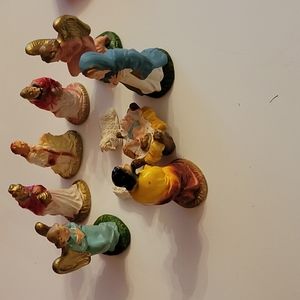 Mother, father, baby Jesus, 2 angels Shepard, kings man and 2 sheep.